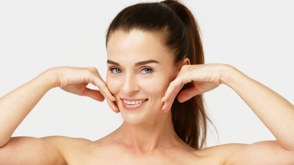 Woman smiling after PRF treatments in Wakefield, MA Woman smiling after PRF treatments in Wakefield, MA